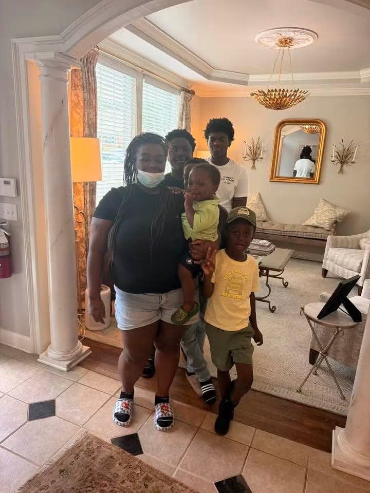 Family standing inside their new South Carolina home after closing
